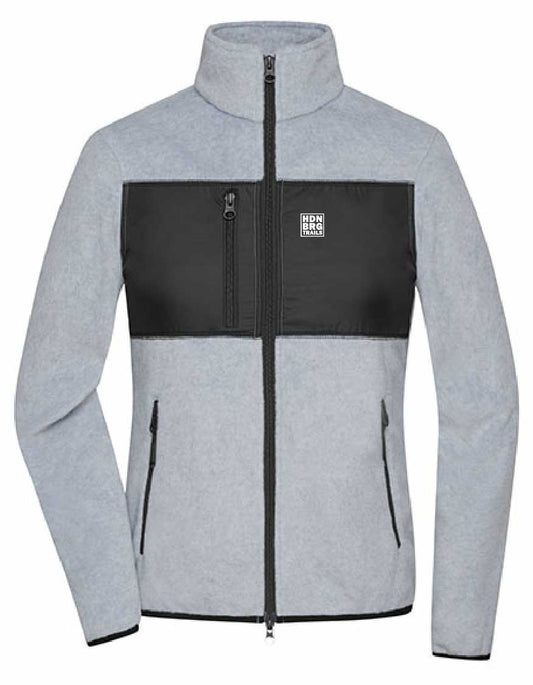 A lightgrey Jacket with a embroided "HDNBRG Trails" Emblem on the left Chest.