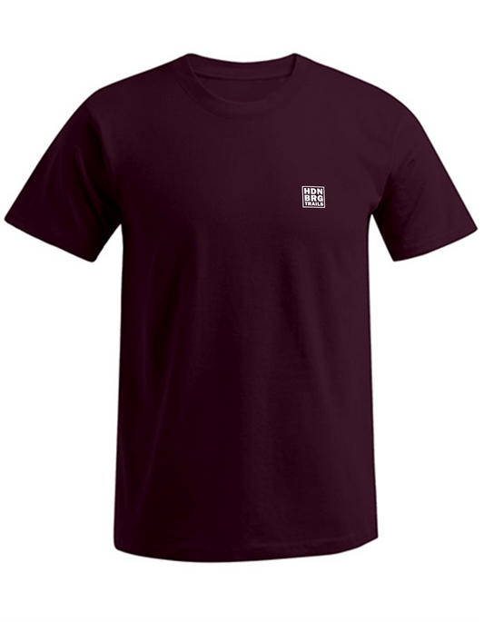 A burgundy coloured Shirt with a embroided "HDNBRG Trails" Emblem on the left Chest.