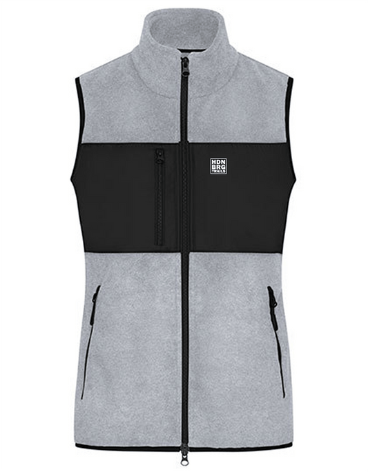 A lightgrey Jacket with a embroided "HDNBRG Trails" Emblem on the left Chest.